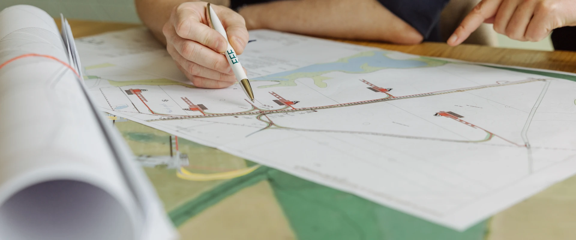 Person is working with a map